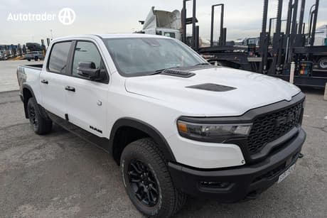 White 2025 RAM 1500 Crew Cab Utility Rebel Hurricane