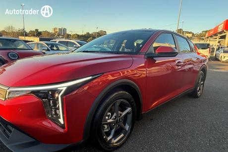 Red 2024 Kia K4 Sedan S
