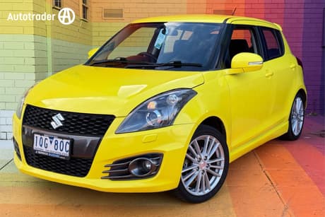 Yellow 2016 Suzuki Swift Hatchback Sport Navigator