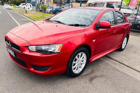 Red 2012 Mitsubishi Lancer Sedan Es