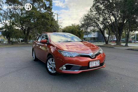 Orange 2015 Toyota Corolla Hatchback Ascent Sport