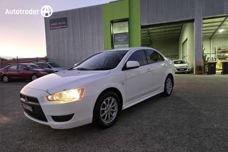 White 2010 Mitsubishi Lancer Sedan Es