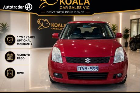 Red 2005 Suzuki Swift Hatchback