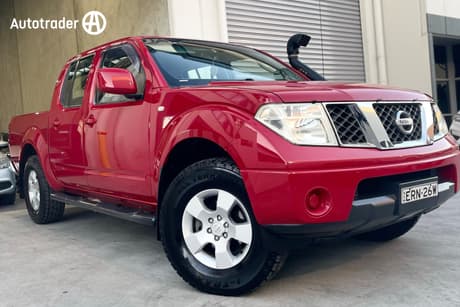 Red 2010 Nissan Navara Dual Cab Pick-up St (4X4)