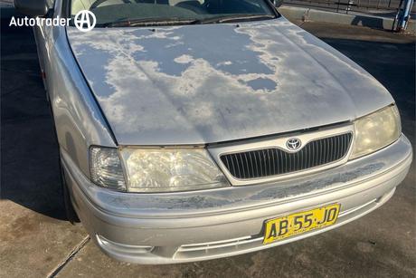 White 2001 Toyota Avalon Sedan CONQUEST