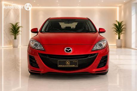 Red 2010 Mazda 3 Sedan Maxx