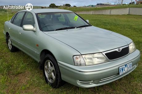 Green 2002 Toyota Avalon Sedan Conquest