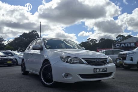 White 2009 Subaru Impreza Hatchback Rx (Awd)