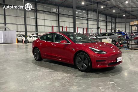 Red 2020 Tesla Model 3 Sedan Standard Range Rwd