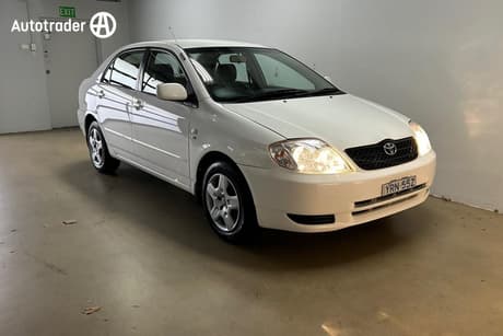 White 2002 Toyota Corolla Sedan Conquest