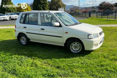 White 1999 Mazda 121 Hatchback Metro Shades