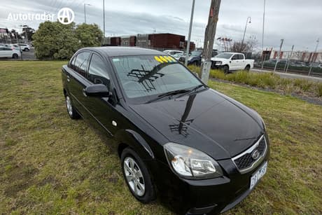 Black 2011 Kia RIO Sedan Si