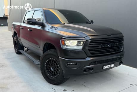 Grey 2024 RAM 1500 Crew Cab Utility Laramie Sport Rambox Mhev