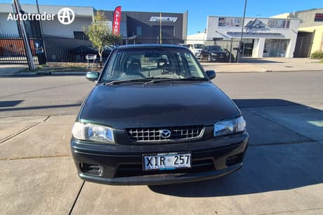 Green 1998 Mazda 121 Hatchback Metro Shades