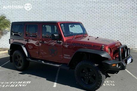 Red 2011 Jeep Wrangler SUV UNLIMITED SPORT
