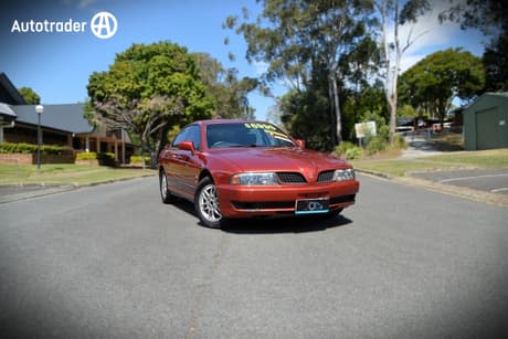 Red 2003 Mitsubishi Magna Sedan Awd