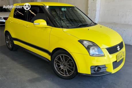 Yellow 2010 Suzuki Swift Hatchback Sport