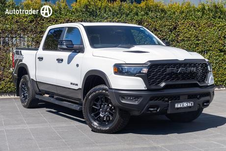 White 2025 RAM 1500 Crew Cab Utility Rebel Hurricane
