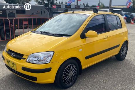 Yellow 2003 Hyundai Getz Hatchback Gl