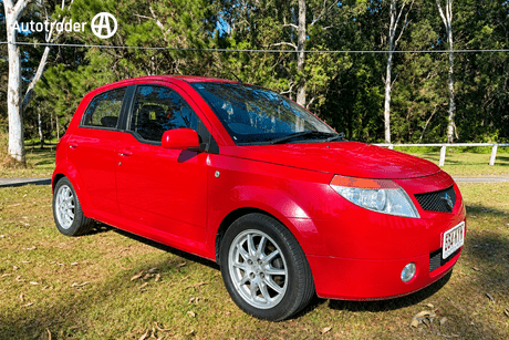 Red 2007 Proton Savvy Hatchback
