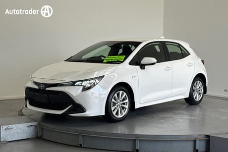White 2024 Toyota Corolla Hatchback Ascent Sport + Conv Pk Hybrid
