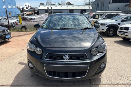 Black 2013 Holden Barina Sedan Cdx