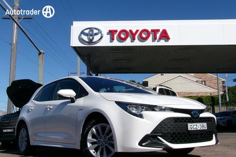White 2025 Toyota Corolla Hatchback Ascent Sport Hybrid