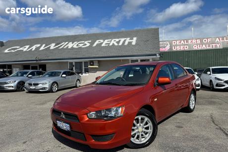 Orange 2011 Mitsubishi Lancer Sedan Es