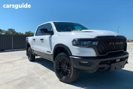 White 2025 RAM 1500 Crew Cab Utility Rebel Hurricane
