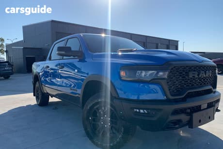 Blue 2025 RAM 1500 Crew Cab Utility Rebel Hurricane