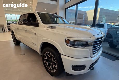 White 2025 RAM 1500 Crew Cab Utility Rebel Hurricane