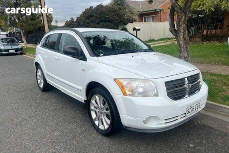 White 2011 Dodge Caliber Hatchback Sxt