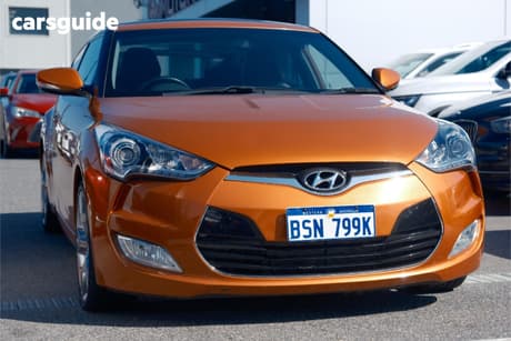 Orange 2012 Hyundai Veloster Coupe +
