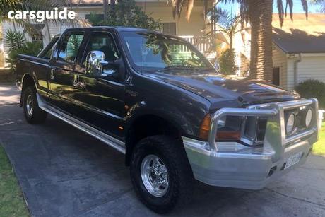 Grey 2003 Ford F250 Crew Cab Pickup Xlt (4X4)