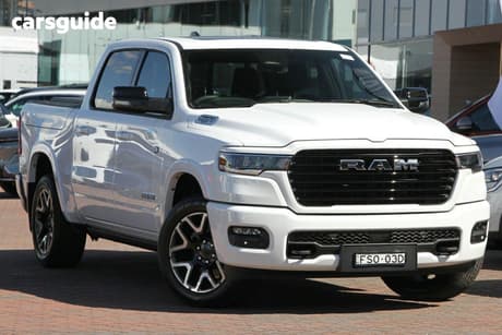 White 2025 RAM 1500 Crew Cab Utility Rebel Hurricane