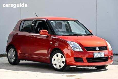 Orange 2008 Suzuki Swift Hatchback