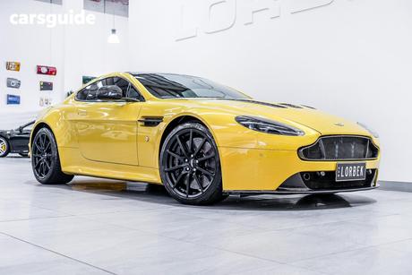 Yellow 2014 Aston Martin V12 Coupe Vantage S