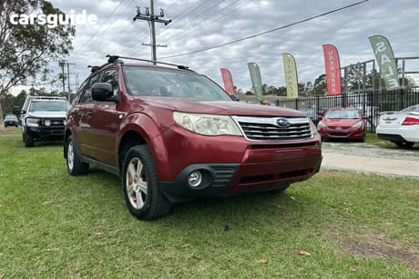 Red 2010 Subaru Forester Wagon X