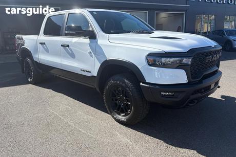 White 2025 RAM 1500 Crew Cab Utility Rebel Hurricane