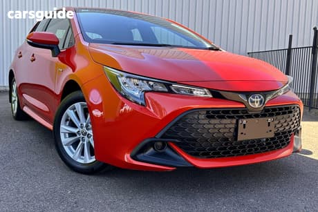 Orange 2023 Toyota Corolla Hatchback Ascent Sport Hybrid