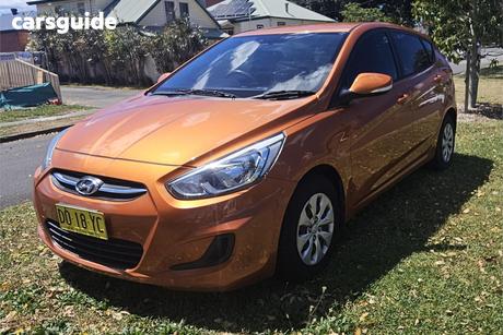 Orange 2015 Hyundai Accent Hatchback Active