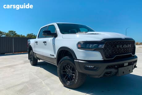 White 2025 RAM 1500 Crew Cab Utility Rebel Hurricane