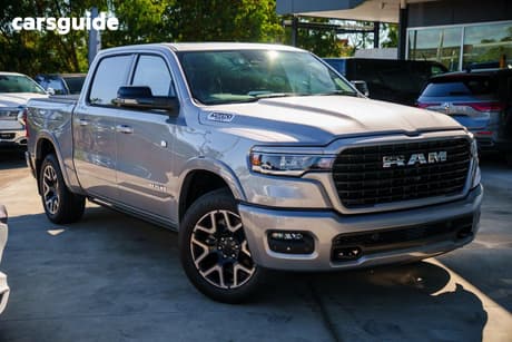 Silver 2025 RAM 1500 Crew Cab Utility Rebel Hurricane