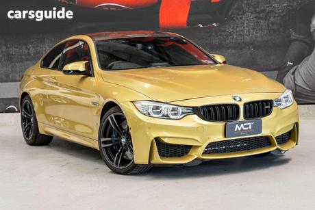 Yellow 2014 BMW M4 Coupe