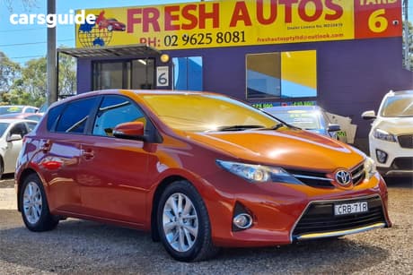 Orange 2013 Toyota Corolla Hatchback Ascent Sport