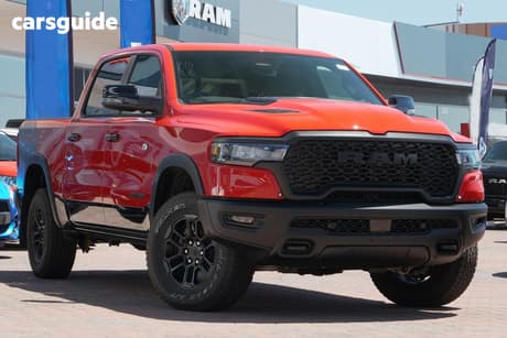 Red 2025 RAM 1500 Crew Cab Utility Rebel Hurricane