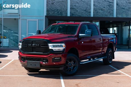 Red 2024 RAM 2500 Crew Cab Utility Laramie Yellowstone