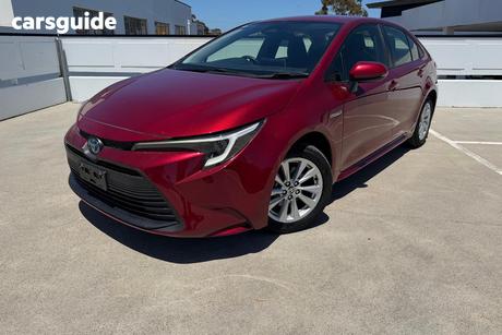 Red 2023 Toyota Corolla Sedan Ascent Sport Hybrid