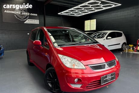 Red 2009 Mitsubishi Colt Hatchback Vr-X