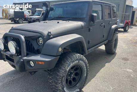Black 2011 Jeep Wrangler Softtop Unlimited Sport (4X4)